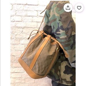 Authentic Gucci Monogram Drawstring Shoulder Bag